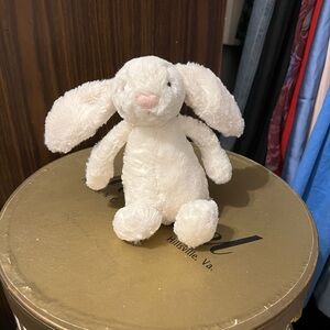 Small cream / white bunny Jellycat. Free with $100 purchase (: